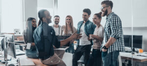people chatting in an office